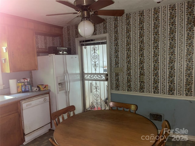 205 Rudolph Rd, Salisbury, NC 28146 - dining space featuring a ceiling fan and wallpapered walls