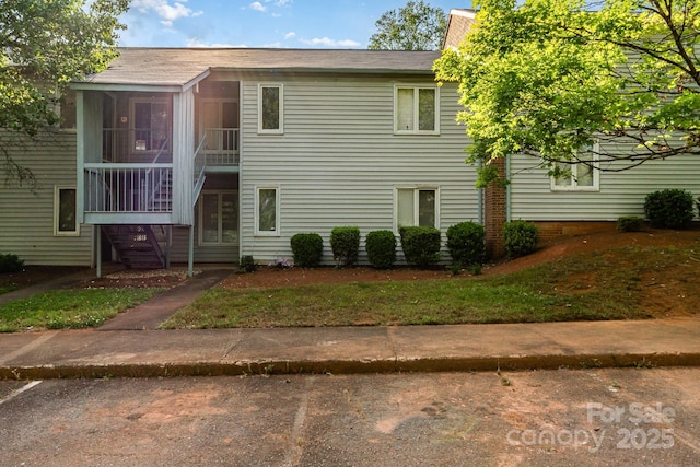 2026 Harvest Ln, Charlotte, NC 28210 - exterior space with roof with shingles and a sunroom