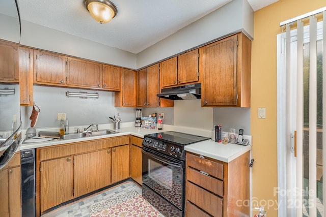 2026 Harvest Ln, Charlotte, NC 28210 - kitchen featuring brown cabinetry, light countertops, under cabinet range hood, black electric range, and a sink