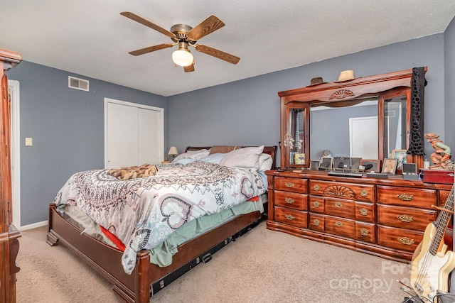 2026 Harvest Ln, Charlotte, NC 28210 - bedroom with a ceiling fan, visible vents, light carpet, and a closet