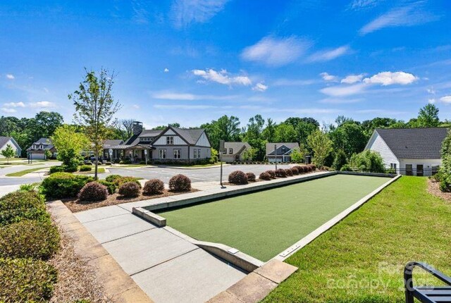 213 Warbler Dr, Wesley Chapel, NC 28110 - surrounding community with a bocce ball area