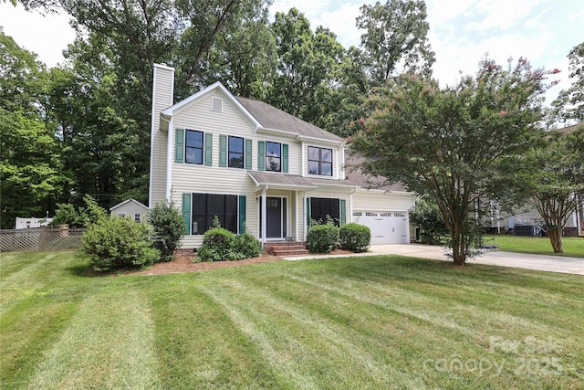 2011 Redwood Dr, Indian Trail, NC 28079 - traditional-style home featuring a chimney, driveway, and a garage
