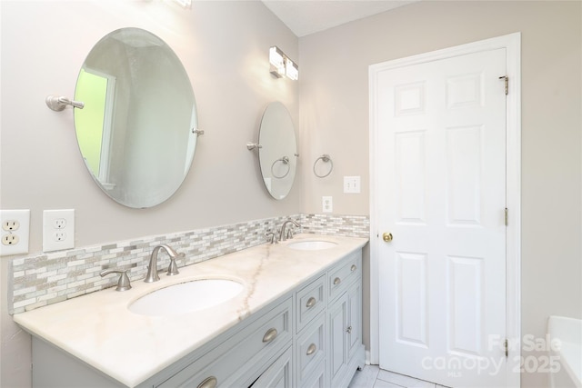 2011 Redwood Dr, Indian Trail, NC 28079 - bathroom with double vanity and decorative backsplash