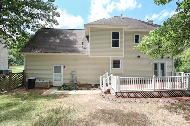 2011 Redwood Dr, Indian Trail, NC 28079 - back of house featuring a wooden deck and roof with shingles