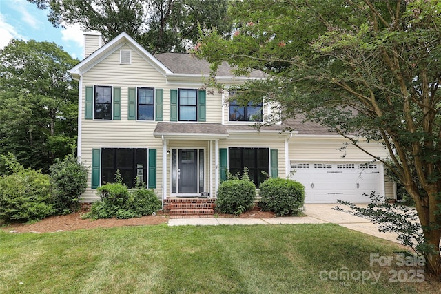 2011 Redwood Dr, Indian Trail, NC 28079 - traditional-style home featuring a chimney, a front lawn, concrete driveway, roof with shingles, and an attached garage