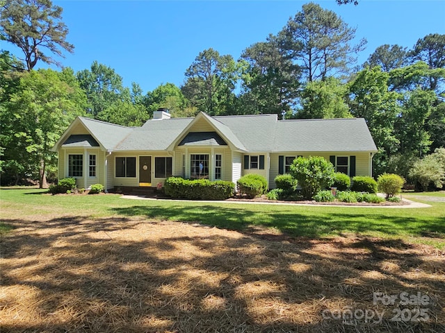 5903 Wm Griffin Rd, Monroe, NC 28112 - ranch-style house with a chimney and a front yard