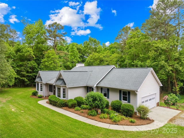 5903 Wm Griffin Rd, Monroe, NC 28112 - ranch-style home with a front yard, concrete driveway, a chimney, a garage, and roof with shingles