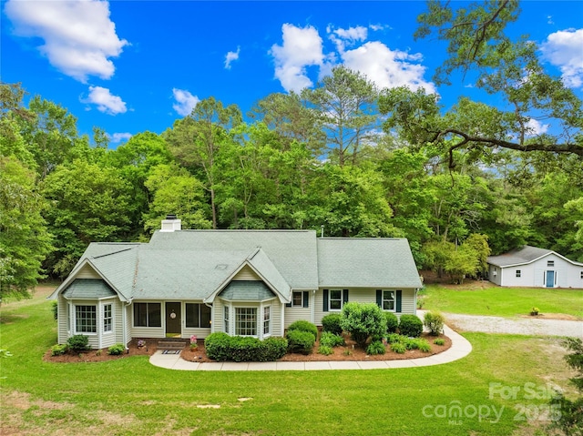 5903 Wm Griffin Rd, Monroe, NC 28112 - view of front of property featuring a front lawn, a chimney, entry steps, and roof with shingles