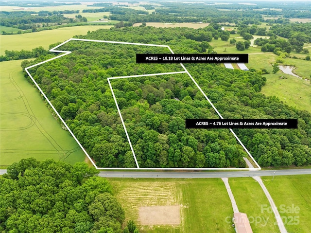 5903 Wm Griffin Rd, Monroe, NC 28112 - view of rural area with a heavily wooded area