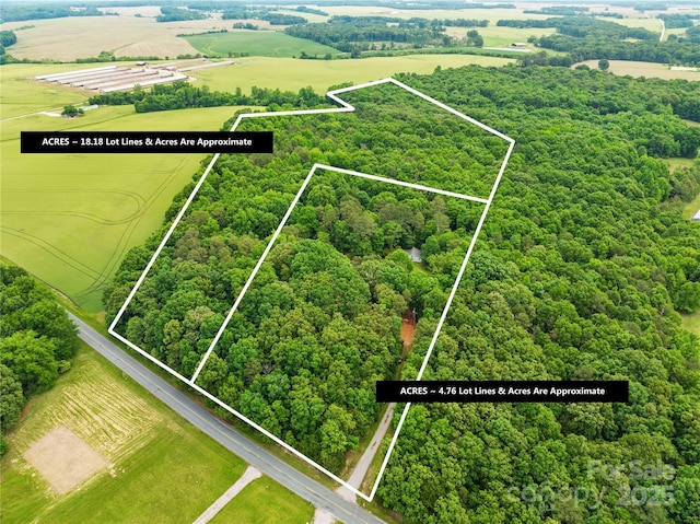 5903 Wm Griffin Rd, Monroe, NC 28112 - aerial view of sparsely populated area with property parcel outlined and a heavily wooded area