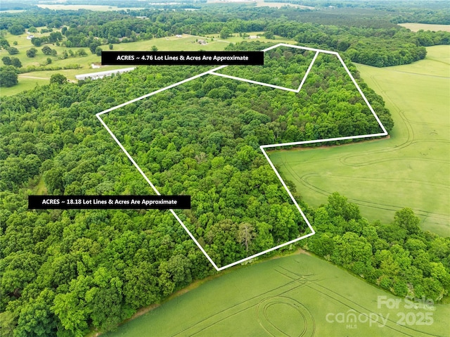 5903 Wm Griffin Rd, Monroe, NC 28112 - aerial view of property and surrounding area with property parcel outlined and a forest