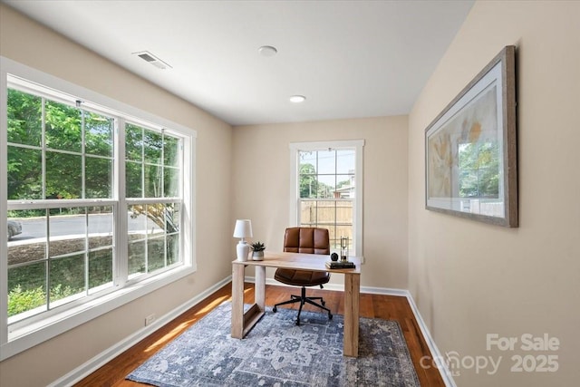 office area featuring baseboards, recessed lighting, dark wood finished floors, and visible vents