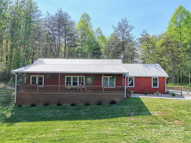 202 Wild Pear Ln Unit 3 & 7A, Franklin, NC 28734 - single story home featuring a front yard, a porch, and metal roof