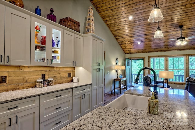 202 Wild Pear Ln Unit 3 & 7A, Franklin, NC 28734 - kitchen with wooden ceiling, a sink, ceiling fan, white cabinets, and glass insert cabinets
