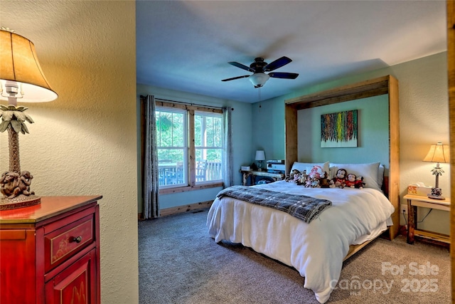 202 Wild Pear Ln Unit 3 & 7A, Franklin, NC 28734 - carpeted bedroom featuring a textured wall, baseboards, and a ceiling fan