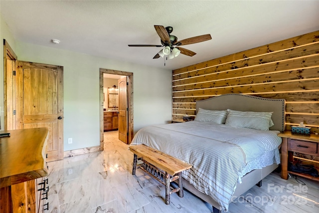 202 Wild Pear Ln Unit 3 & 7A, Franklin, NC 28734 - bedroom featuring a ceiling fan, ensuite bathroom, and wood walls
