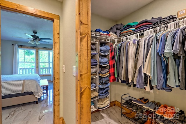 202 Wild Pear Ln Unit 3 & 7A, Franklin, NC 28734 - spacious closet with a ceiling fan and marble finish flooring