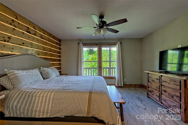 202 Wild Pear Ln Unit 3 & 7A, Franklin, NC 28734 - bedroom featuring a ceiling fan and baseboards