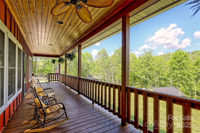 202 Wild Pear Ln Unit 3 & 7A, Franklin, NC 28734 - wooden terrace featuring ceiling fan and a view of trees