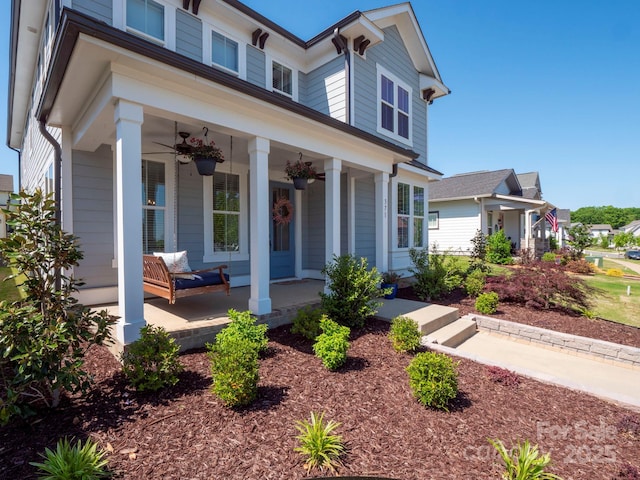 traditional-style home featuring a porch