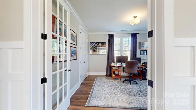 office with baseboards, ornamental molding, french doors, and dark wood-type flooring