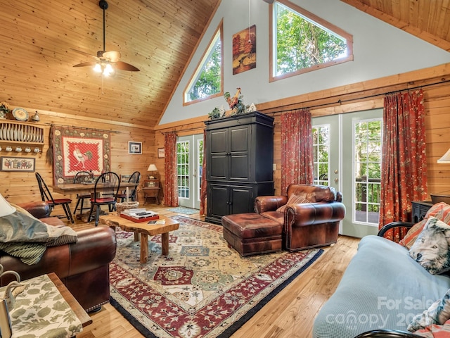 480 River Crest Parkway, Rutherfordton, NC 28139 - living area with wooden walls, high vaulted ceiling, french doors, and wood ceiling
