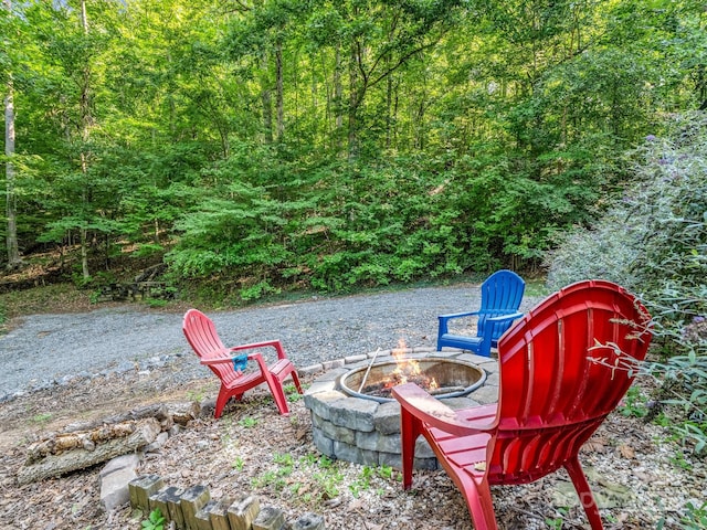 480 River Crest Parkway, Rutherfordton, NC 28139 - exterior space with a forest view and a fire pit