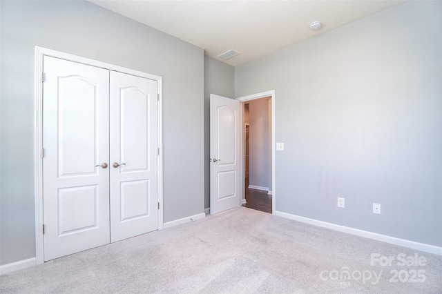 3073 Oliver Stanley Trl, Lancaster, SC 29720 - unfurnished bedroom with baseboards, carpet, a closet, and visible vents