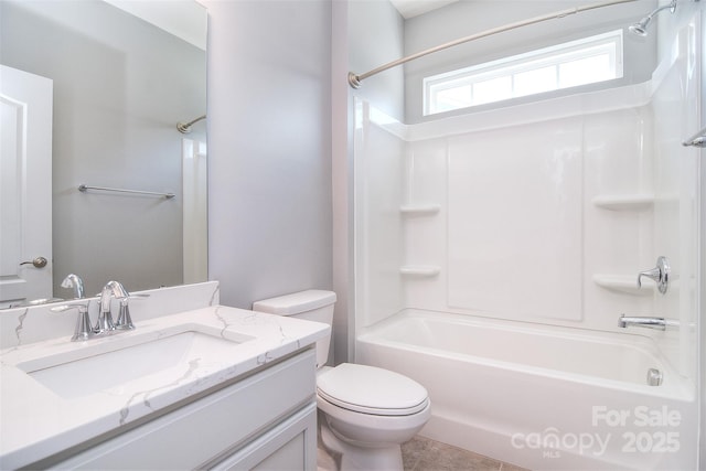 3073 Oliver Stanley Trl, Lancaster, SC 29720 - bathroom featuring vanity, washtub / shower combination, tile patterned floors, and toilet