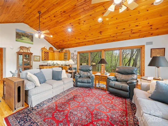 living area with recessed lighting, light wood-type flooring, wooden ceiling, a ceiling fan, and vaulted ceiling