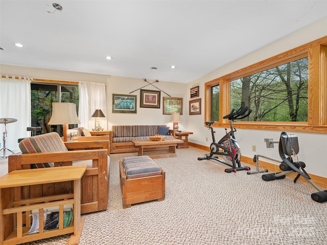 living room featuring carpet flooring, recessed lighting, and baseboards