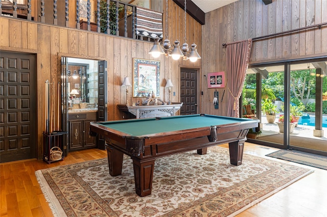 69 Forest Rd, Asheville, NC 28803 - game room featuring wooden walls, billiards, a towering ceiling, wood finished floors, and beam ceiling