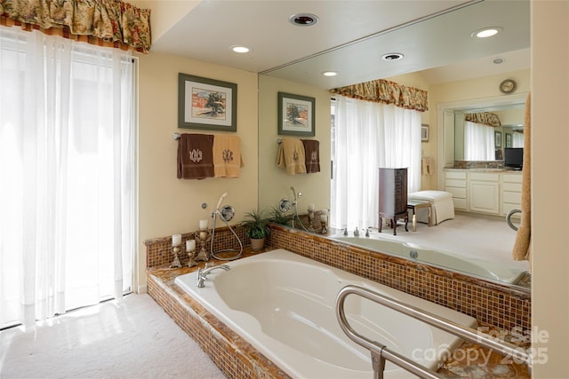 69 Forest Rd, Asheville, NC 28803 - bathroom featuring a bath, vanity, recessed lighting, and plenty of natural light