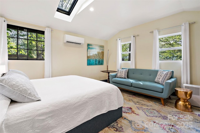 bedroom with recessed lighting, a wall mounted AC, and lofted ceiling with skylight