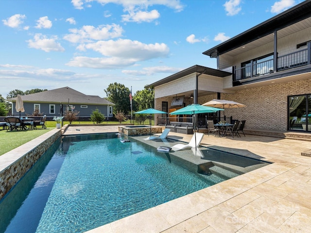 4315 Hartis Grove Church Rd, Indian Trail, NC 28079 - view of swimming pool featuring a patio area, outdoor dining area, a pool with connected hot tub, and a yard