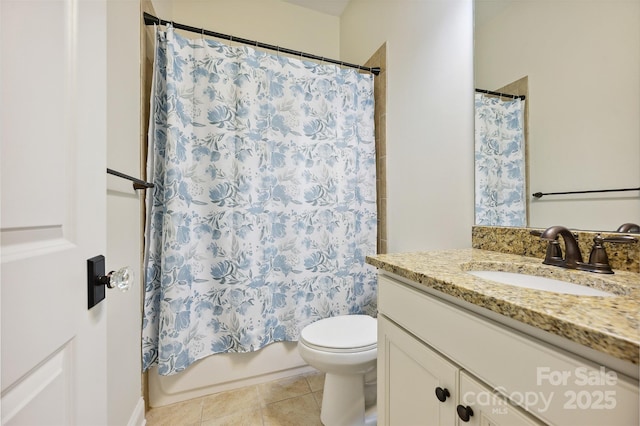 full bath with toilet, vanity, shower / tub combo, and tile patterned floors