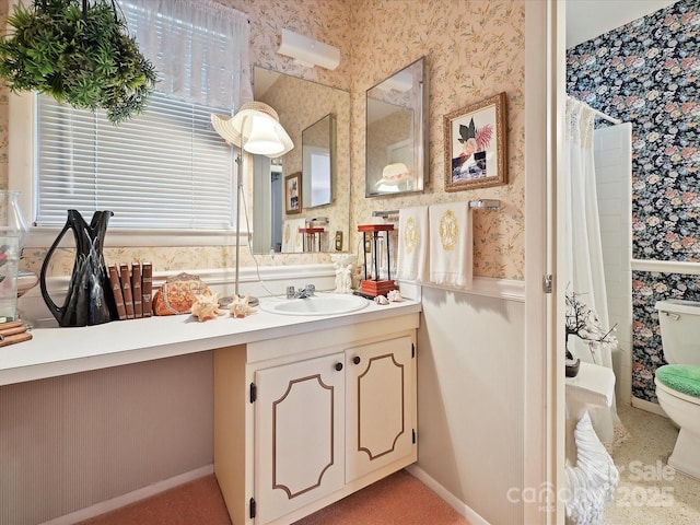 full bath featuring wallpapered walls, toilet, a wealth of natural light, and vanity