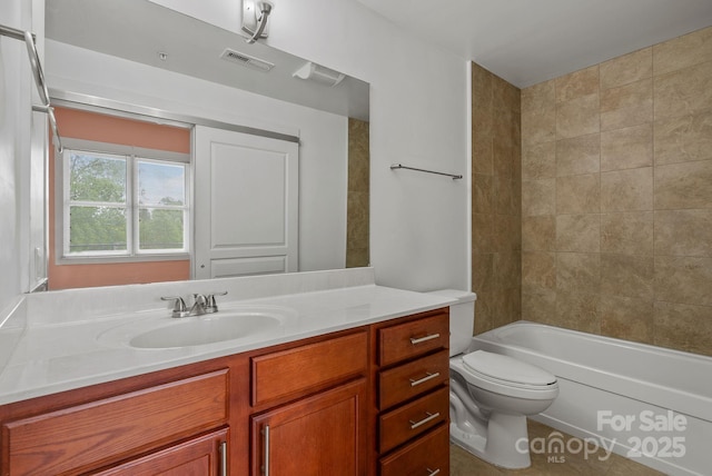 full bath featuring toilet, shower / bathtub combination, vanity, and visible vents