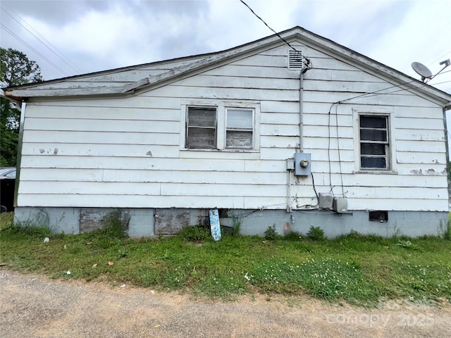 302 Melrose Dr SW, Concord, NC 28025 - view of property exterior featuring crawl space