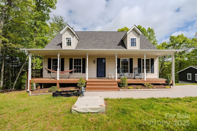 76 Overlook Pointe Dr, Spruce Pine, NC 28777 - view of front facade with a front lawn, a porch, and roof with shingles