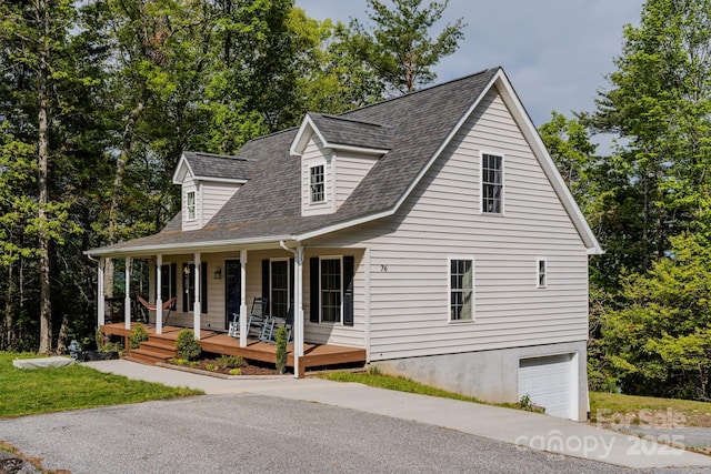 76 Overlook Pointe Dr, Spruce Pine, NC 28777 - cape cod-style house featuring an attached garage, a porch, and a shingled roof
