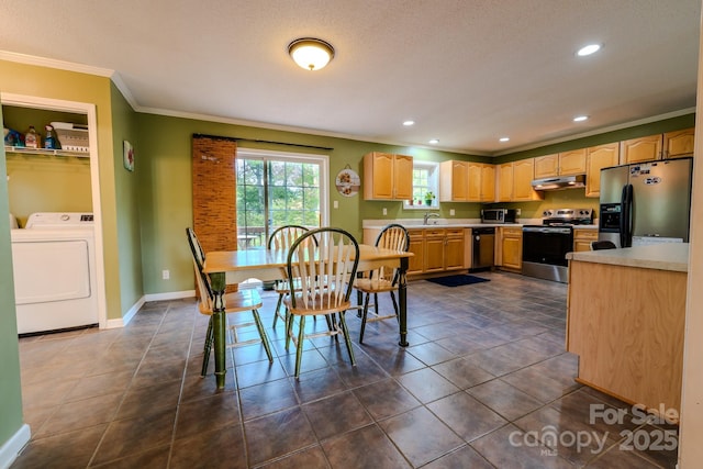 76 Overlook Pointe Dr, Spruce Pine, NC 28777 - dining room with washer / dryer, ornamental molding, dark tile patterned flooring, recessed lighting, and baseboards