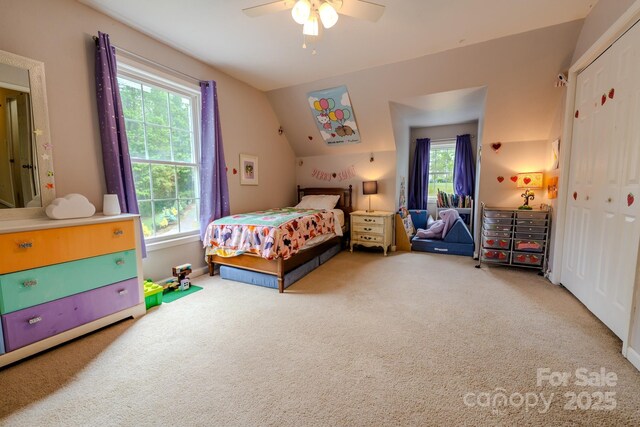 76 Overlook Pointe Dr, Spruce Pine, NC 28777 - carpeted bedroom with a closet, vaulted ceiling, and ceiling fan