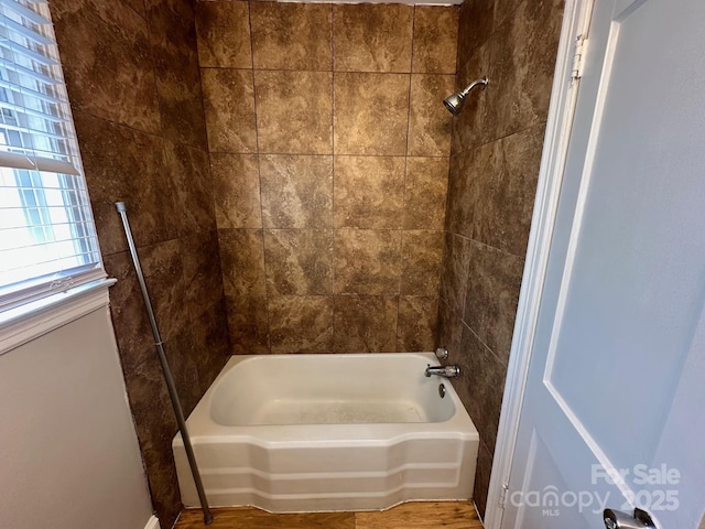 full bathroom featuring  shower combination