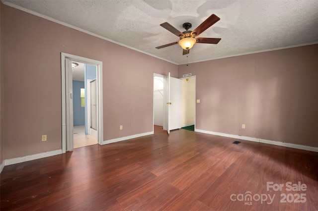 257 River Crest Dr, Flat Rock, NC 28731 - interior space featuring wood finished floors, a ceiling fan, crown molding, a textured ceiling, and baseboards