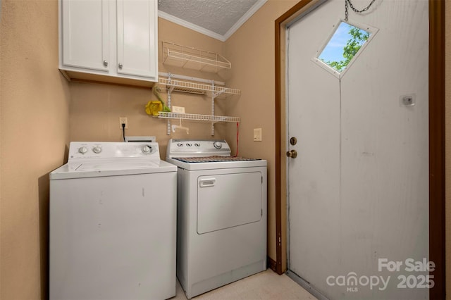 257 River Crest Dr, Flat Rock, NC 28731 - laundry area featuring washer and dryer, cabinet space, light floors, a textured ceiling, and ornamental molding