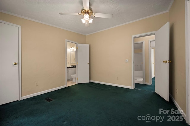 257 River Crest Dr, Flat Rock, NC 28731 - unfurnished bedroom with a textured ceiling, ensuite bath, crown molding, and carpet