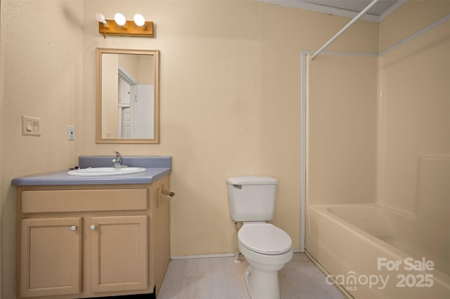 257 River Crest Dr, Flat Rock, NC 28731 - bathroom with toilet, bathing tub / shower combination, baseboards, and vanity