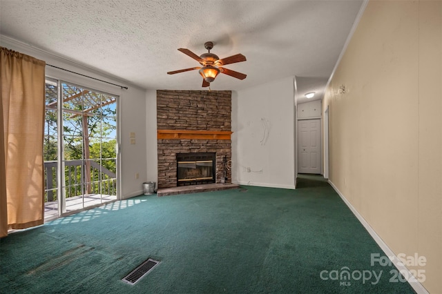 257 River Crest Dr, Flat Rock, NC 28731 - unfurnished living room featuring a ceiling fan, a textured ceiling, carpet flooring, visible vents, and a fireplace