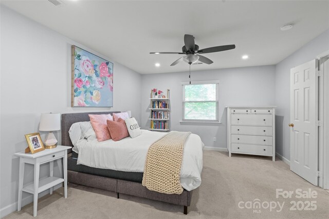 carpeted bedroom with baseboards, a ceiling fan, and recessed lighting
